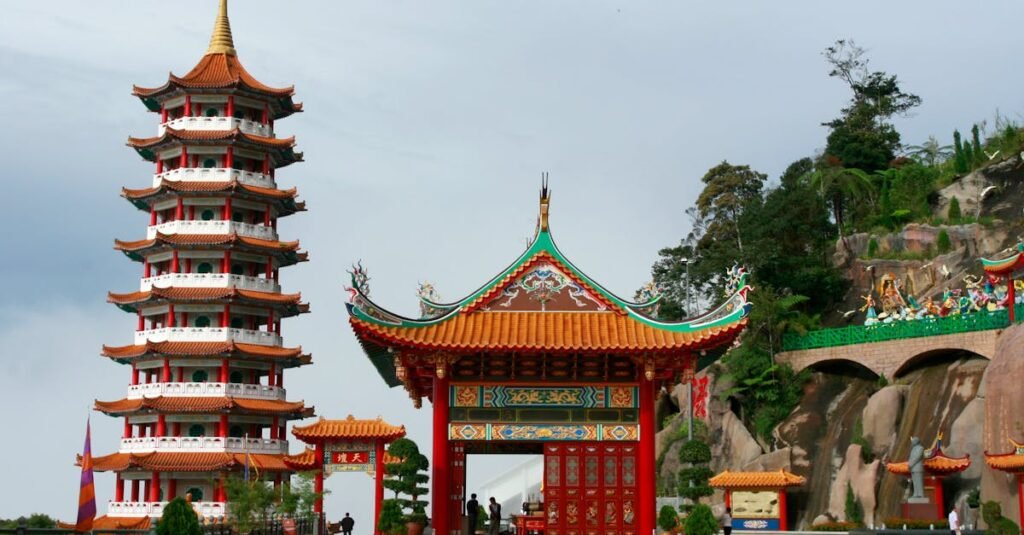 Vibrant Chinese architecture of Chin Swee Caves Temple in Genting Highlands, Malaysia. Iconic pagoda and gate.